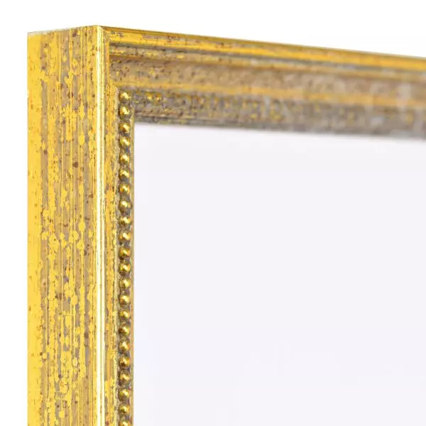 Ansicht der Ecke eines klassischen, antiken Holzrahmens in der Farbe Altgold mit Perlkante 